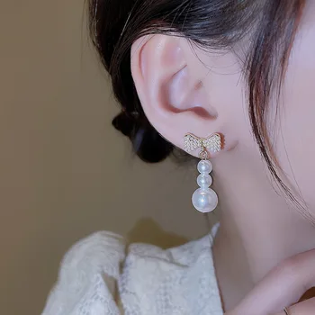 Korejski Simuplated Biser Dolgo Uhan Dekle Elegantno Nakit korejski Srčkan Pearl Tlakovane Visijo Bowknot Earing boucles d'oreilles perle